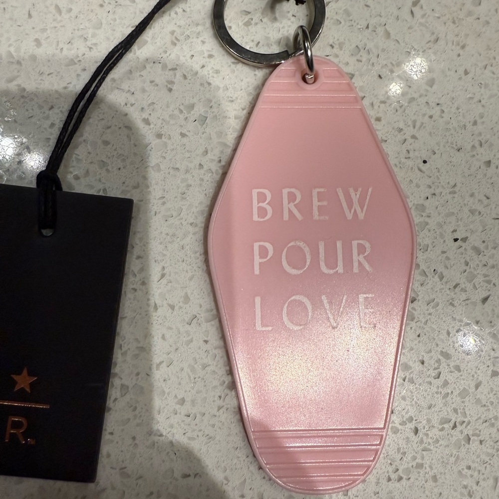 Starbucks Reserve Pink Keychain with 'Brew Pour Love'
